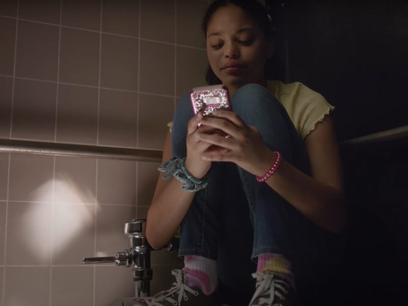 Still image of actress Symera Jackson in school bathroom stall