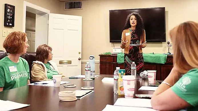 Woman presenting in a meeting for Sandy Hook Promise