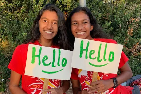 Students from Carmel High School in California holding Hello Signs