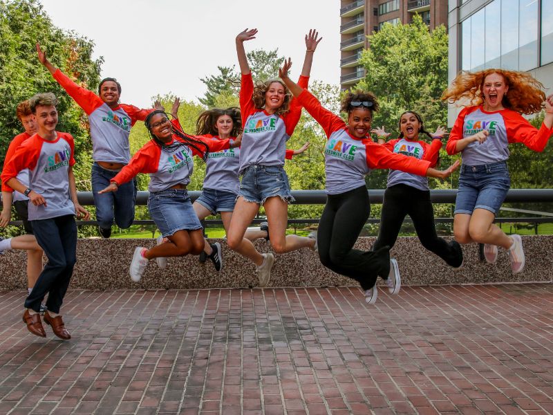 2023-24 Youth Advisory Board members jumping