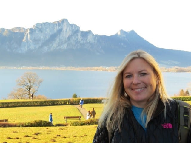 Michelle Lund, a donor to Sandy Hook Promise, is seen standing before a park and mountain range.