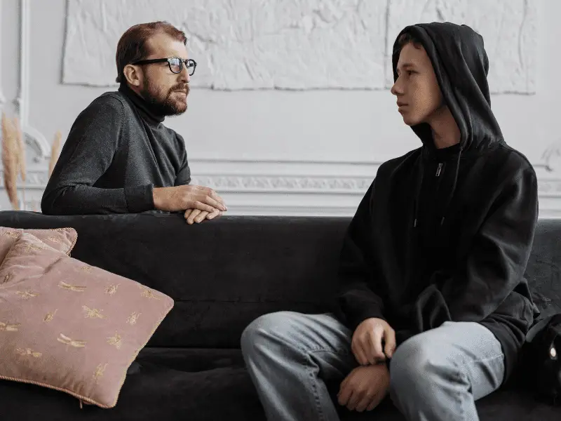 Student talking to a trusted adult