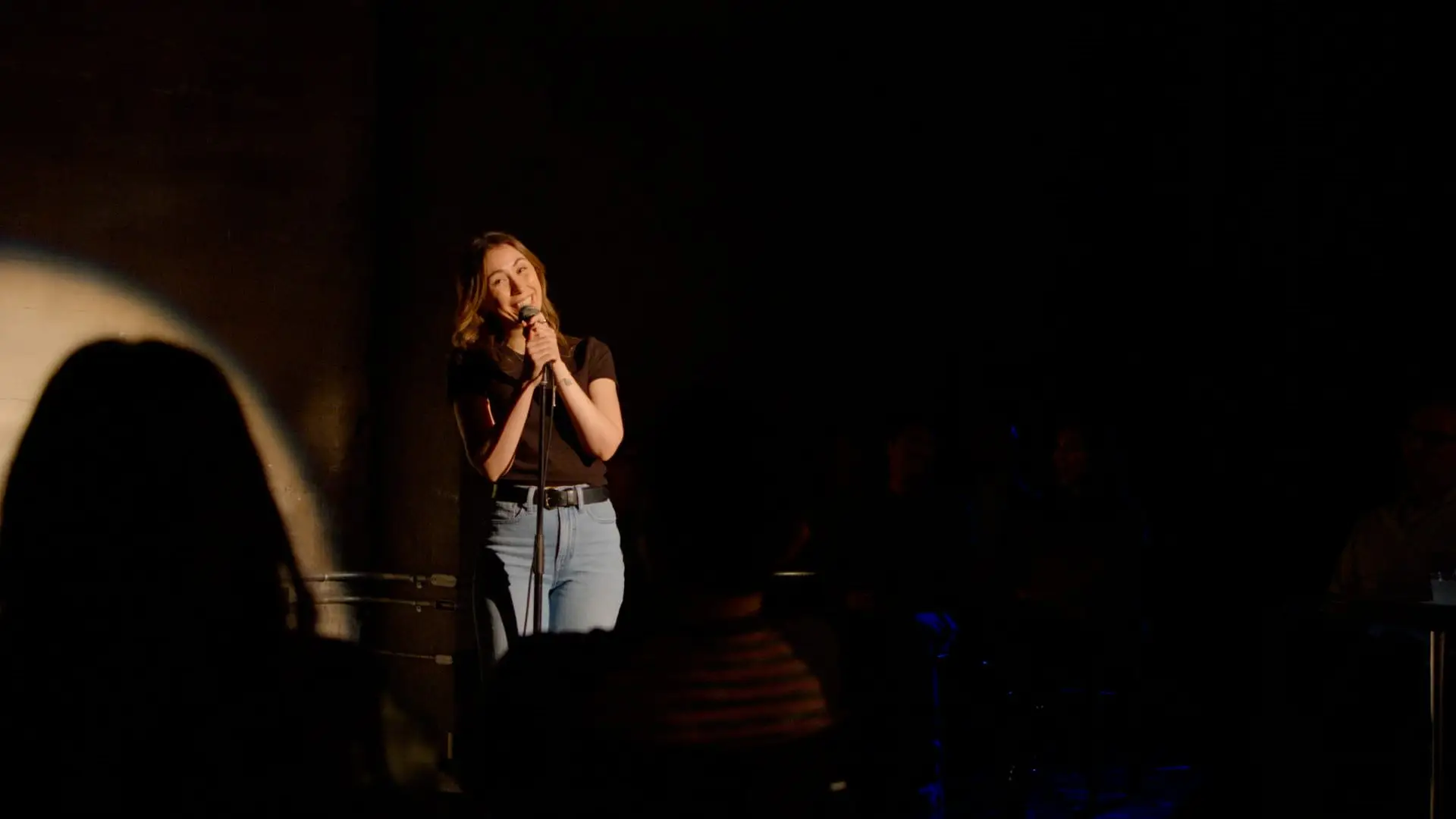Comedian Caitlin Reilly on stage