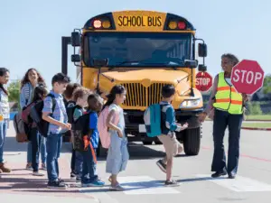 School children crossing crosswalk