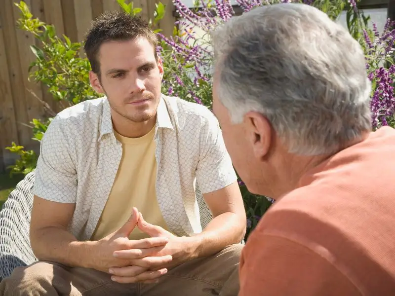 Men engaged in a difficult conversation