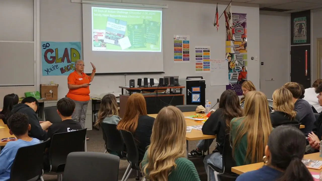 Carleen Wray leading a SAVE Promise club training session
